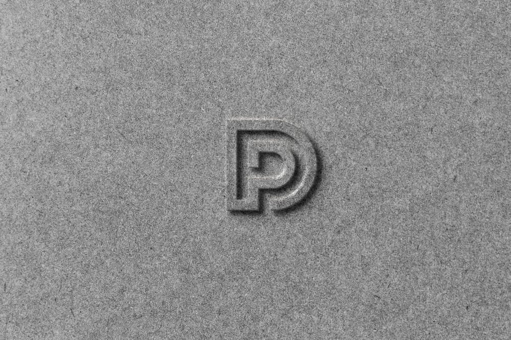 Embossed Silver Logo Mockup
