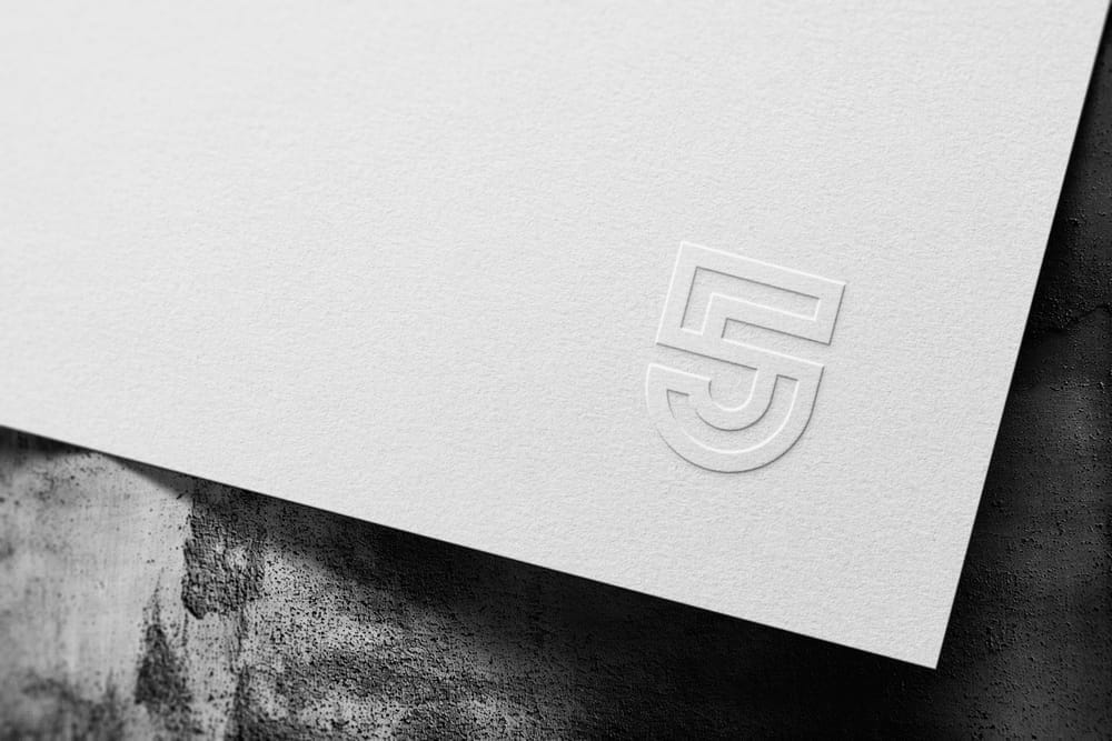 Paper Logo Mockup On Wall Background