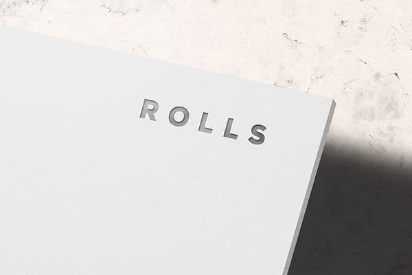 Realistic Rolls Branding Paper Logo Mockup